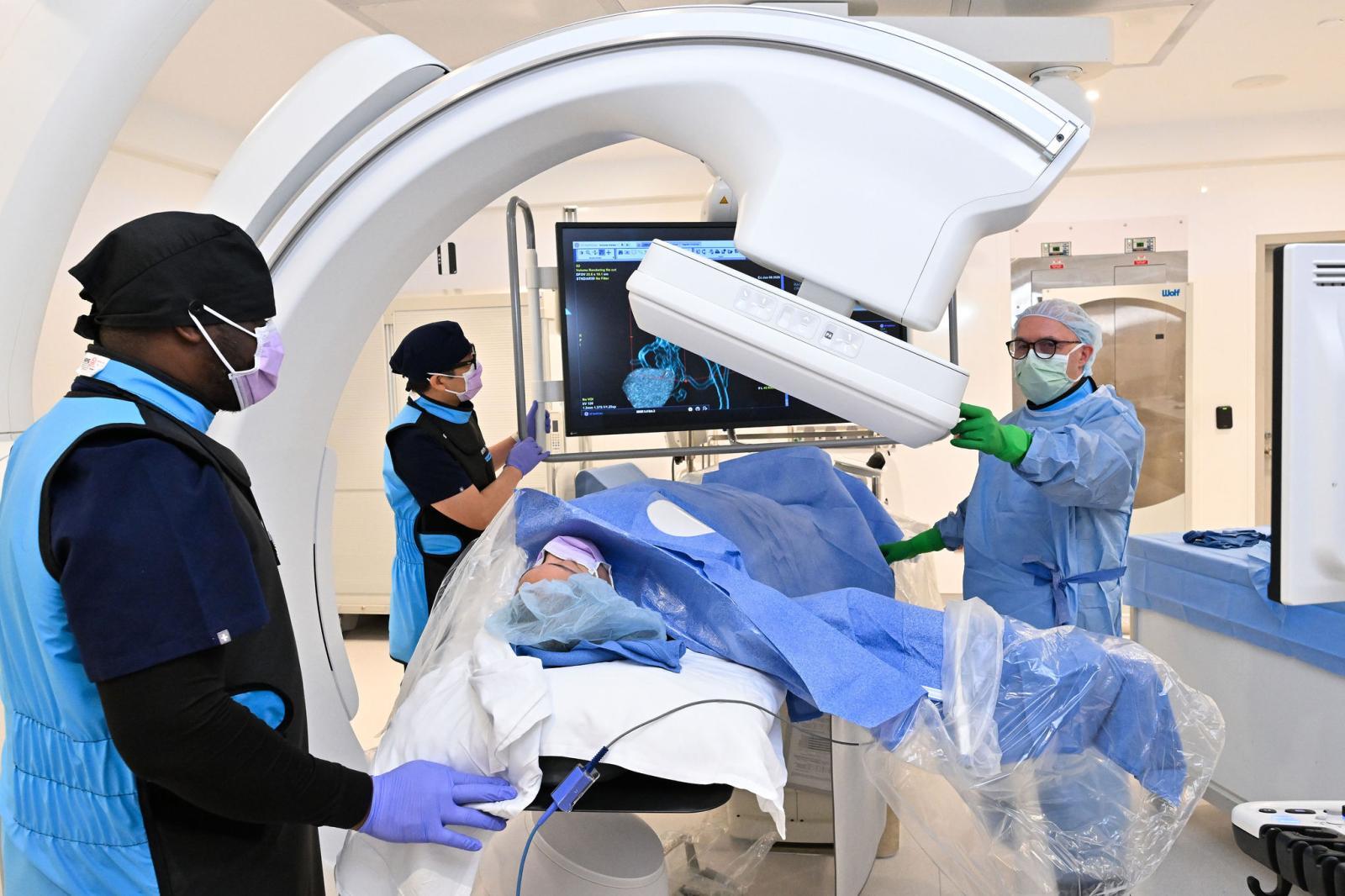 Interventional radiologist performing a procedure