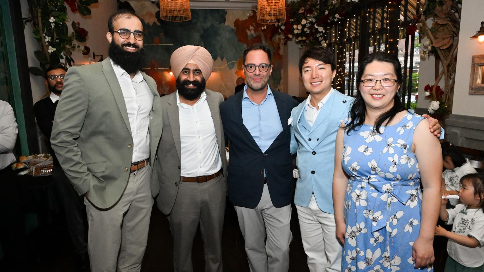 Group of five physicians