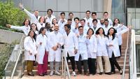 Group of physicians in white coats